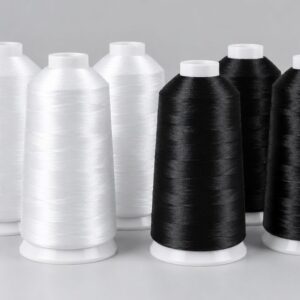 White and black cones of embroidery thread